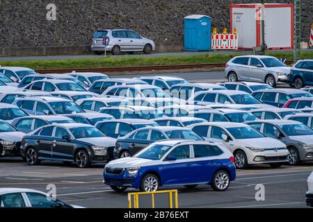 Emden, cars waiting in the port for shipment, VW plant, East Frisia, Lower Saxony, Germany Stock Photo