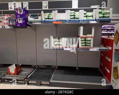 https://l450v.alamy.com/450v/2b76g8c/rushden-uk-13th-mar-2020-bare-shelves-where-eggs-are-normally-sold-this-lidl-store-in-peterborough-now-has-a-sign-in-the-entrance-informing-shoppers-they-are-not-allowed-to-bulk-buy-pastarice-packs-of-water-eggs-and-flour-toilet-rolltissueswips-medicine-cleaning-products-and-multi-packs-crisps-soup-etc-with-these-being-limited-to-2-per-shop-many-people-are-stock-piling-items-from-food-handwash-and-toilet-roll-amid-the-coronavirus-status-at-the-moment-coronavirus-panic-buying-peterborough-cambridgeshire-uk-on-march-13-2020-credit-paul-marriottalamy-live-news-2b76g8c.jpg