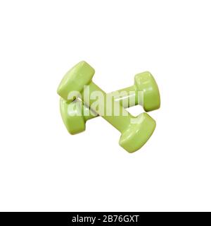 pair of small light yellow-green rubberized dumbbells isolated on a white background Stock Photo