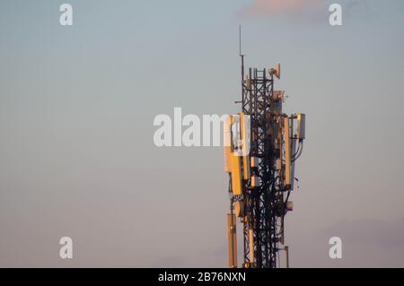 Jaipur, India, Circa 2020 - Photograph of a telephone tower situated in the middle of a residential area. The tower is made of metal and is used to bo Stock Photo