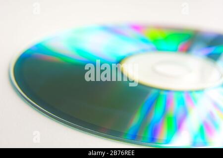 CD Compact Disk with Rainbow Reflection Closeup Stock Photo