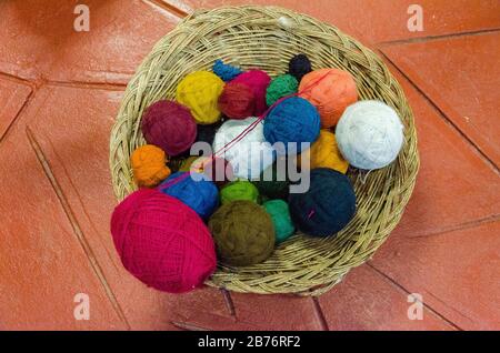 Sheep wool spun and dyed manually with natural dyes in Chincheros, Peru Stock Photo
