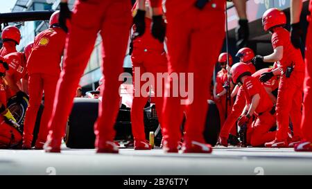 Team Ferrari rehearse a pit lane tyre change ahead of the Australian Formula One Grand Prix Stock Photo