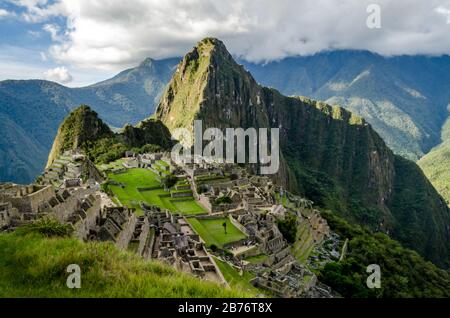 Classic photo of Machu Picchu with the face looking up and the citadel ...