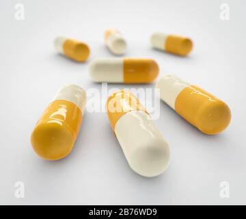 Computer generated image of capsules modelled on sample of methylphenidate, a stimulant drug for treating attention deficit hyperactivity disorder and narcolepsy. Stock Photo