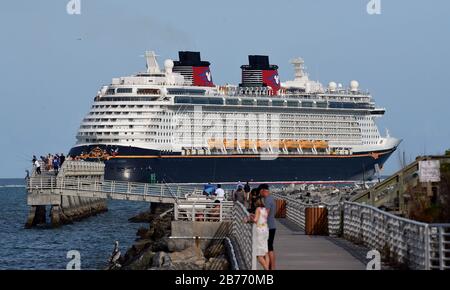 Port Canaveral, United States. 13th Mar, 2020. The Disney Dream cruise ship departs from Port Canaveral in Florida the day before the cruise line suspends its operations for all new departures effective March 14 in response to the coronavirus (COVID-19) outbreak. Credit: SOPA Images Limited/Alamy Live News Stock Photo