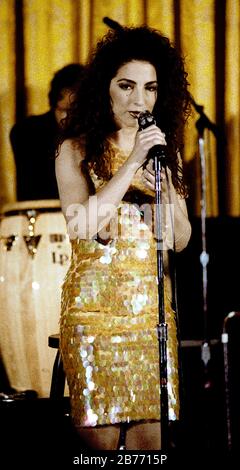 Washington, DC. USA, June 18, 1991 Gloria Estefan performs in the East Room of the White House as the evenings entertainment for the State Dinner honoring President Fernando Collor de Mello of Brazil.  Estefan, who was invited to perform for Collor because she can sing in Portuguese as well as English and Spanish-sometimes, it would seem, simultaneously. Credit: Mark Reinstein/MediaPunch Stock Photo