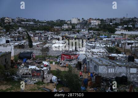 Gaza, Palestine. 13th Mar, 2020. General view of the poor neighbourhood of Khan Yunis refugee camp during a cold weather wave. Credit: SOPA Images Limited/Alamy Live News Stock Photo