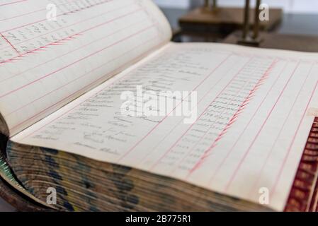 Antique handwritten accounting book of an old and inexistent business Stock Photo