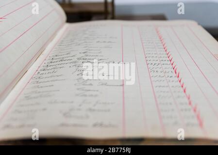 Antique handwritten accounting book of an old and inexistent business Stock Photo