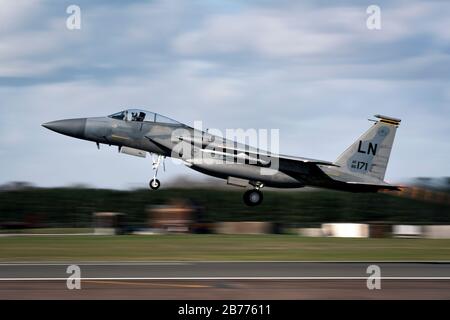 An F-15C Eagle assigned to the 493rd Fighter Squadron takes off from Royal Air Force Lakenheath, England, for routine operations, March 12, 2020. The Eagle is an all-weather, extremely maneuverable, tactical fighter designed to gain and maintain air supremacy over the battlefield. (U.S. Air Force photo by Staff Sgt. Rachel Maxwell) Stock Photo