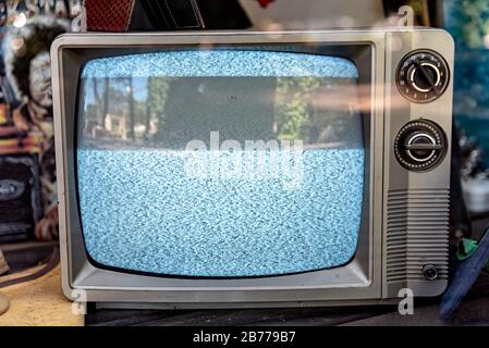Old TV with noise in the tuning Stock Photo
