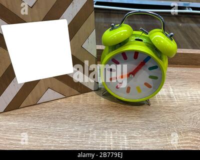 Clock and sign board on the table Stock Photo