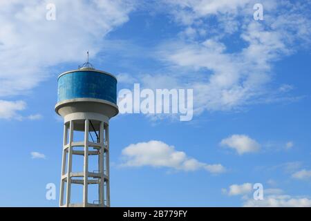 Water Storage tank on blue sky background. Stock Photo