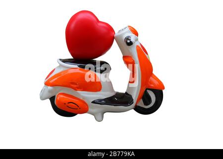 Motorcycle toy with heart isolated on white background.This had clipping path. Stock Photo