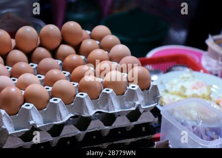 Panel eggs for Pad-thai (thai word food name) in night market street thai Select soft focus Stock Photo