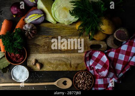 Cooking concept with organic vegetables on wooden vintage background with copy space Stock Photo