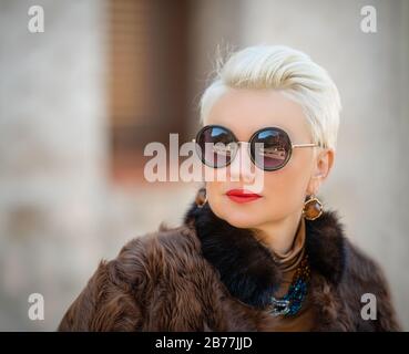 Closeup portrait of attractive young businesswoman, smiling Stock Photo