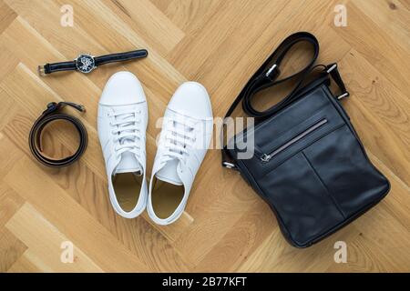 Overhead view Men trendy casual outfits on wooden background Stock Photo