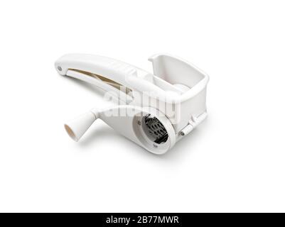 Plastic grinder cheese grater isolated on white with clipping path Stock Photo