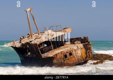 Meisho Maru No 38 Japanese fishing boat shipwrecked on rocky coastline of L'agulhas where Pacific and Atlantic oceans meet South Africa Stock Photo