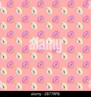 Trendy square seamless pattern of traditional doughnuts with lilac and white glazes on gentle pink background. Regular rhythmic pattern. Top view, fla Stock Photo