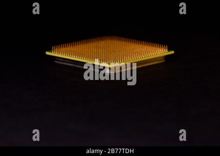 Processor of personal computer on a black background. Copy space around. CPU. Stock Photo