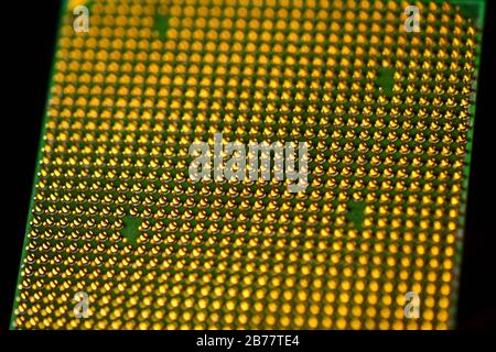 Pins of central processor unit. CPU close-up. Bottom side. Stock Photo