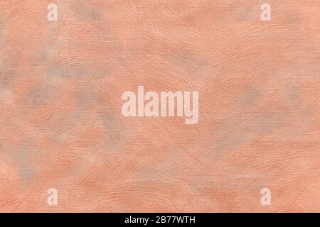 Abstract grungy decorative texture. Textured paper with copy space. The mottled surface of the paper is orange, texture closeup. Stock Photo