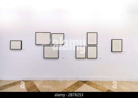 Close view of a bunch of empty blank frames on museum exhibition. Stock Photo