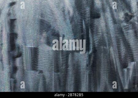 Close-up texture of flat steel surface manually cleaned with a flap wheel angle grinder. Stock Photo