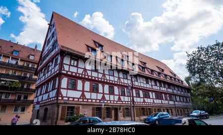 Nuremberg 2019. Weinstadel House, old hostel for travelers and merchants recently renovated. We are on a hot and cloudy summer day. August 2019 in Nur Stock Photo