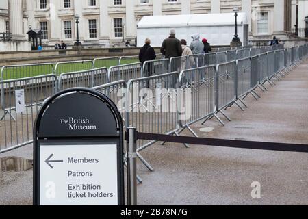 Empty queue lanes at The British Museum this afternoon in London after the Prime Minister said that Covid-19 'is the worst public health crisis for a generation', and the government's top scientist warned that up to 10,000 people in the UK are already infected. Stock Photo