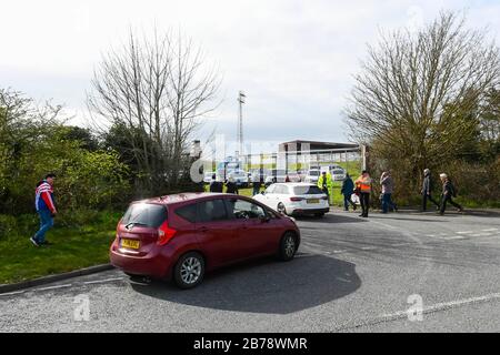 Weymouth, Dorset, UK.  14th March 2020.  Fans arriving for the Weymouth FC v Slough Town Vanarama National League South match at the Bob Lucas Stadium ahead of the 3pm kickoff.  Most National league football is still playing this weekend despite the Premier League and EFL shutting down due to the coronavirus.  Picture Credit: Graham Hunt/Alamy Live News Stock Photo