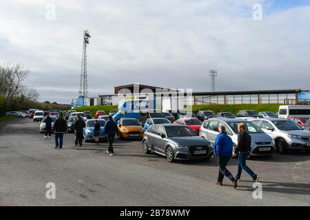 Weymouth, Dorset, UK.  14th March 2020.  Fans arriving for the Weymouth FC v Slough Town Vanarama National League South match at the Bob Lucas Stadium ahead of the 3pm kickoff.  Most National league football is still playing this weekend despite the Premier League and EFL shutting down due to the coronavirus.  Picture Credit: Graham Hunt/Alamy Live News Stock Photo