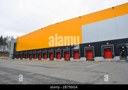 The building of a modern logistics center. Front view of loading docks ...