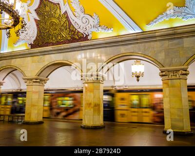 Russia, train passing in Komsomolskaya metro station, one of the most attractive stalinist architecture of Moscow underground Stock Photo