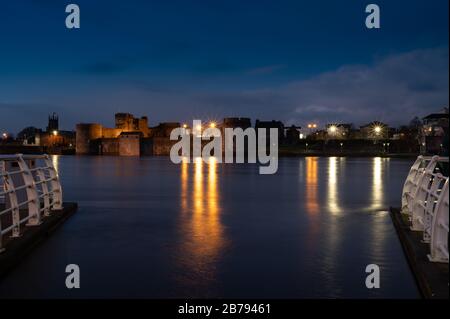 King John's Castle is a 13th-century castle located on King's Island in Limerick, Ireland, next to the River Shannon. Although the site dates back to Stock Photo