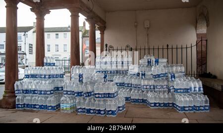 Emergency supplies of bottled water in Kirkby Stephen, Cumbria, after a water mains pipeline failed. Stock Photo