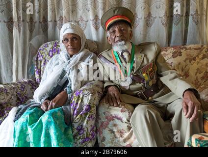 Veteran from the italo-ethiopian war in army uniform with his wife, Addis Ababa Region, Addis Ababa, Ethiopia Stock Photo