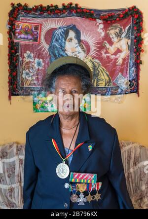 Ethiopian veteran woman from the italo-ethiopian war with a virgin mary decoration, Addis Ababa Region, Addis Ababa, Ethiopia Stock Photo