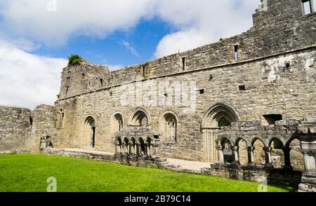 Panoramic view of the ruins of Cong Abbey in County Mayo in Ireland, blue cloud and white clouds. Stock Photo