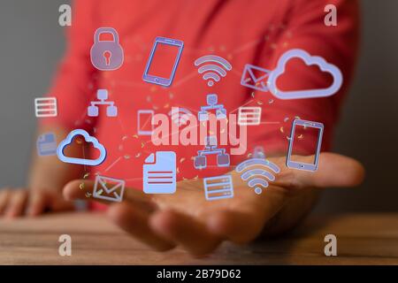 FTP concept. Man holding virtual infographics depicting cloud data and information security Stock Photo
