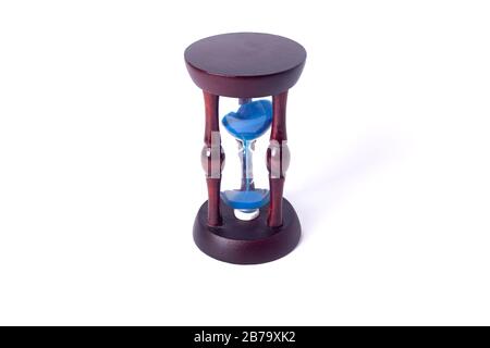 hourglass closeup on an isolated white background Stock Photo