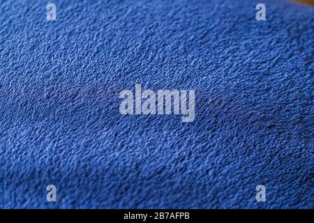 Premium blue fabric texture, decorative textile as background for interior design, close-up Stock Photo