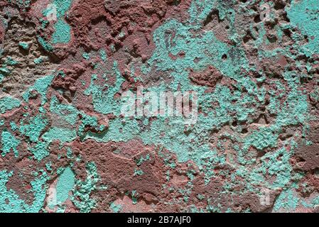Background abstract of textured green and brown wall, close-up Stock Photo