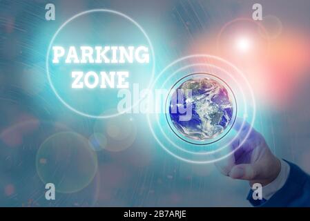 Writing note showing Parking Zone. Business concept for a space where an automobile can be parked Allowed to parked Elements of this image furnished b Stock Photo