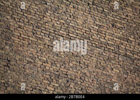 Old brick wall in a backgroun. Texture Stock Photo