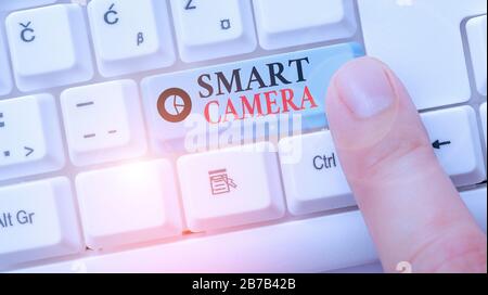 Conceptual hand writing showing Smart Camera. Concept meaning individual image processing systems designed to automate Stock Photo