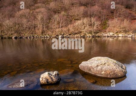 Reflections in Llyn Crafnant in winter, Snowdonia, North Wales Stock Photo